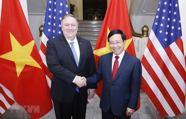 Phó Thủ tướng, Bộ trưởng Ngoại giao Phạm Bình Minh và Bộ trưởng Ngoại giao Mỹ Mike Pompeo hội đàm. (Ảnh: Lâm Khánh/TTXVN)