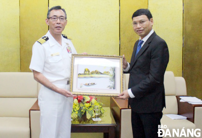 Vice Chairman Minh (right) and Col Nakagama Yoshiyuki