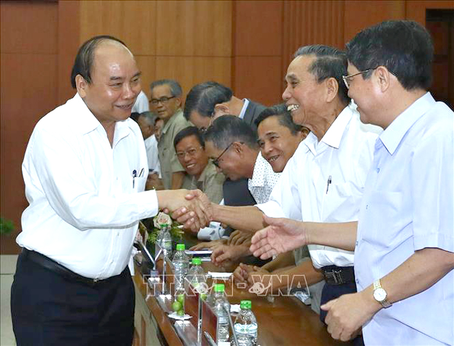 Thủ tướng Nguyễn Xuân Phúc và các đại biểu tại buổi gặp mặt. Ảnh: TTXVN