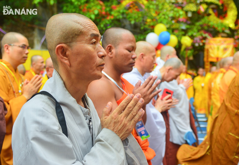 Monks and nuns from South Korea, Thailand and Japan attending a Buddhist ritual