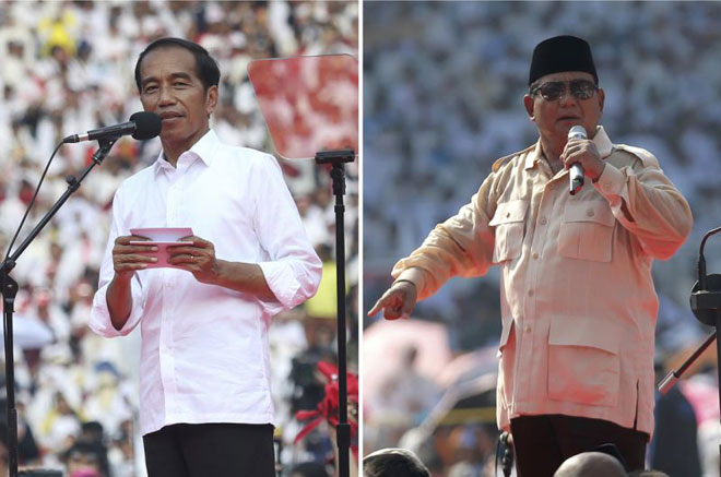 Tổng thống Joko Widodo (trái) và cựu tướng quân đội Prabowo Subianto trong chiến dịch tranh cử ở Jakarta. Ảnh: AP