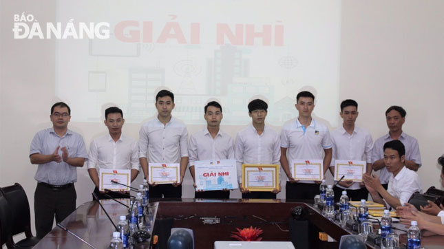 The 6-member group besides their multi-functional garbage collection machine