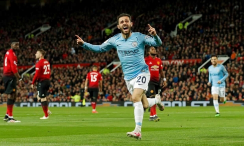 Man City mở toang cánh cửa tới chức vô địch Premier League sau chiến thắng 2-0 trước MU. (Ảnh: Getty)