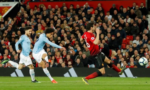 Leroy Sane ấn định chiến thắng 2-0 cho Man City. (Ảnh: Getty)