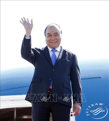 Thủ tướng Nguyễn Xuân Phúc tới sân bay quốc tế Bắc Kinh. Ảnh: Thống Nhất/TTXVN