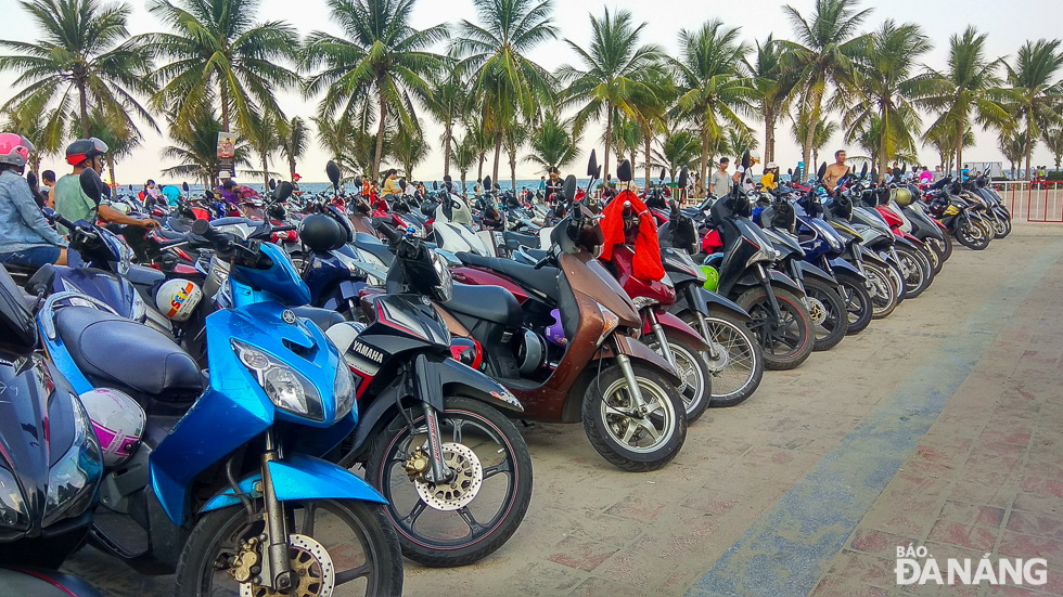 A motorbike parking area at the East Sea Park being fully occupied