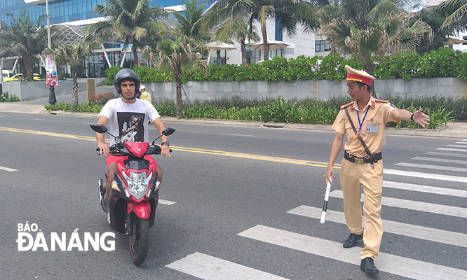 A foreign driver being stopped by the police for a check