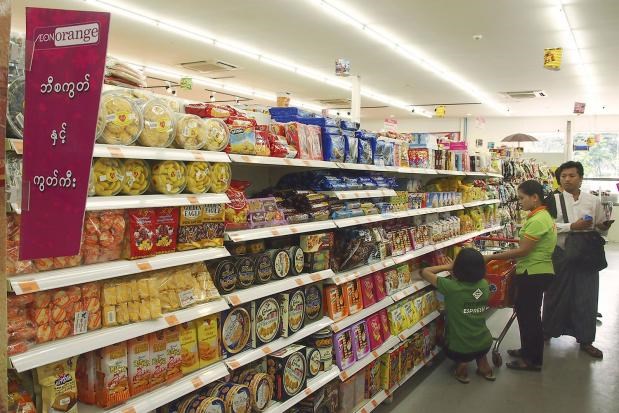 Customers shop at a supermarket of Aeon Orange Co in Yangon (Kyodo photo)