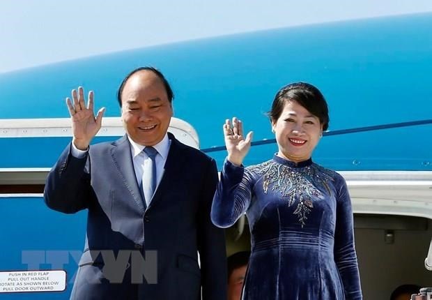 PM Nguyen Xuan Phuc and his spouse (Photo: VNA)