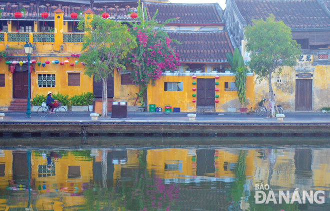 Ancient houses located along the bank of the Hoa River