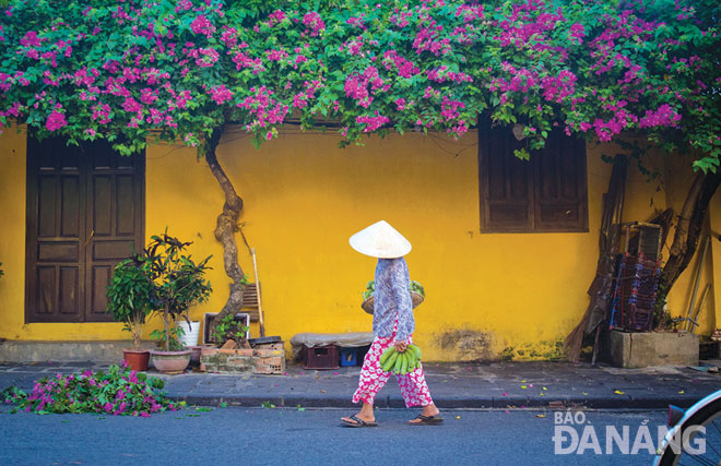 A woman going to the market in the early morning