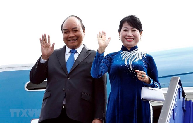 Prime Minister Nguyen Xuan Phuc and his spouse (Source: VNA)