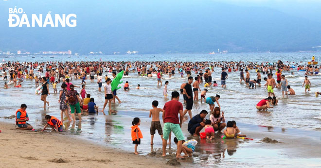 A local beach crowded with visitors