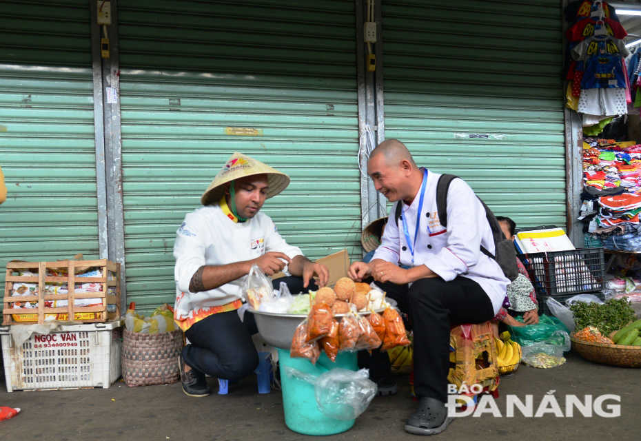 Some of them showing their keen interest in local street food