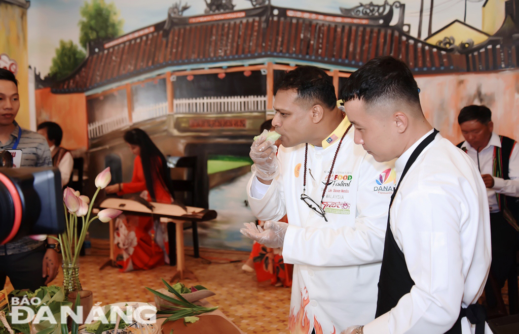 A chef eating spring rolls