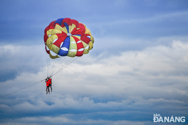 Flying in the air with colorful a parasail wing