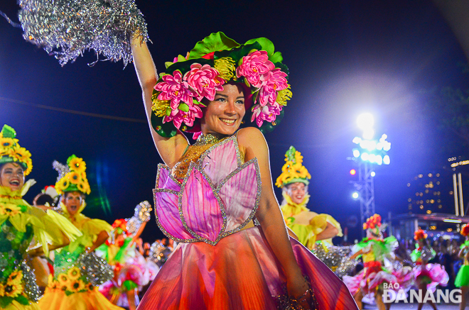 The dancers being in eye-catching costumes which feature the national flower symbols of the 8 countries participating in DIFF 2019