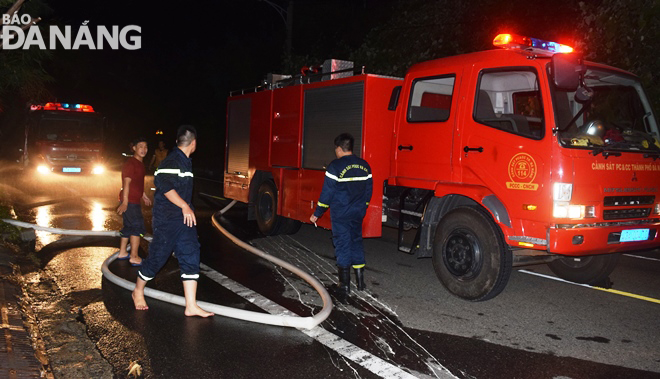 Firefighters and fine engines at the scene