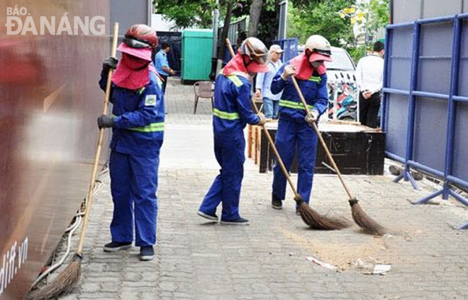 Sanitation workers cleaning up DIFF’s viewing stands