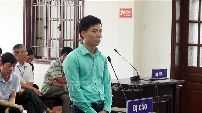 Bị cáo Hoàng Công Lương tại tòa ngày 14-6-2019. Ảnh: Thanh Hải/TTXVN