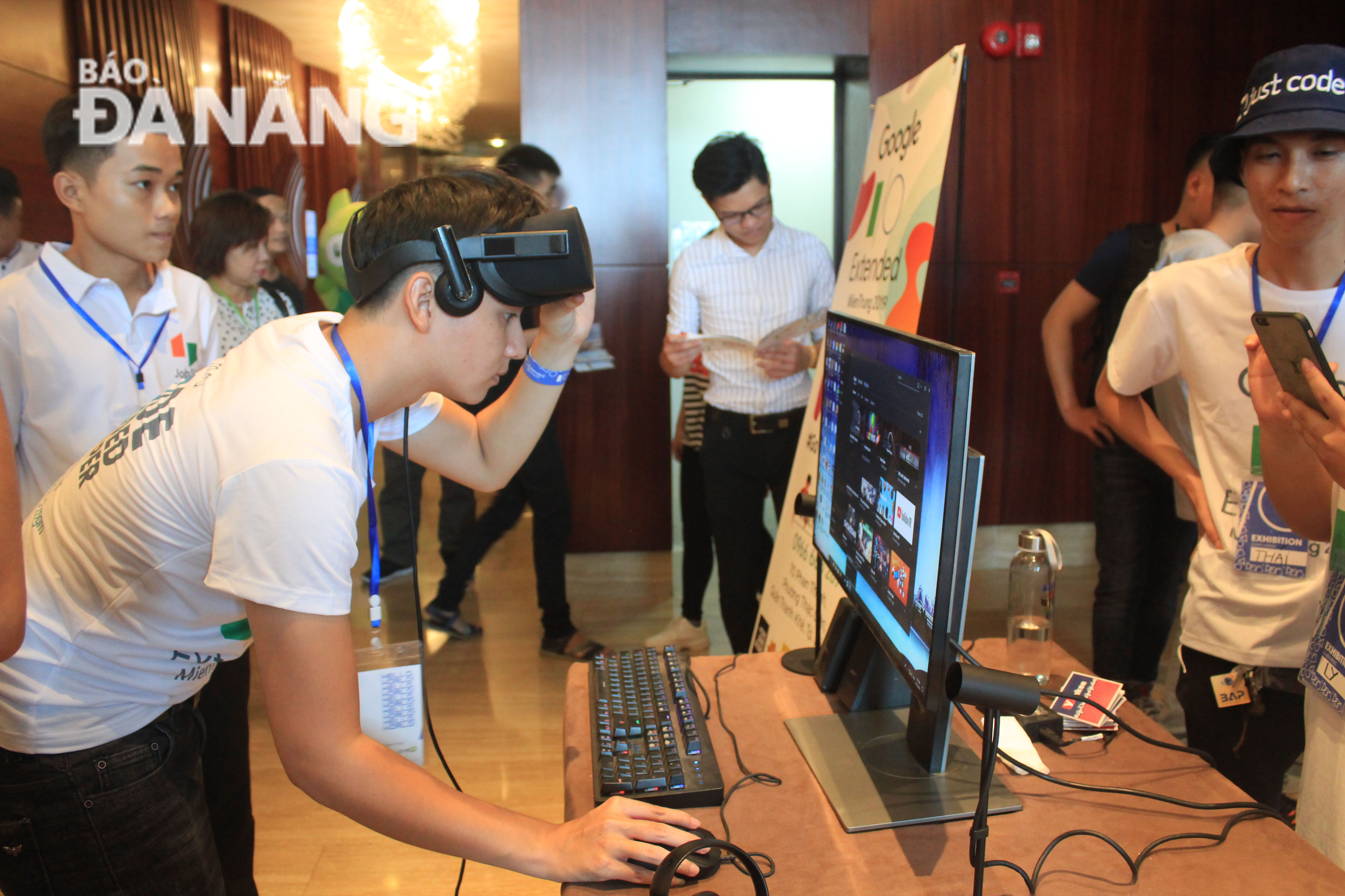 Visitors experiencing virtual reality glasses at a exhibition stand