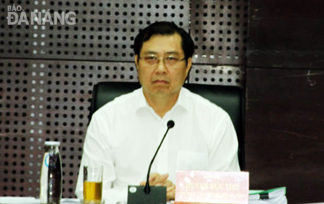 Chủ tịch UBND thành phố Huỳnh Đức Thơ phát biểu tại cuộc họp. 	       Ảnh: TRỌNG HÙNG