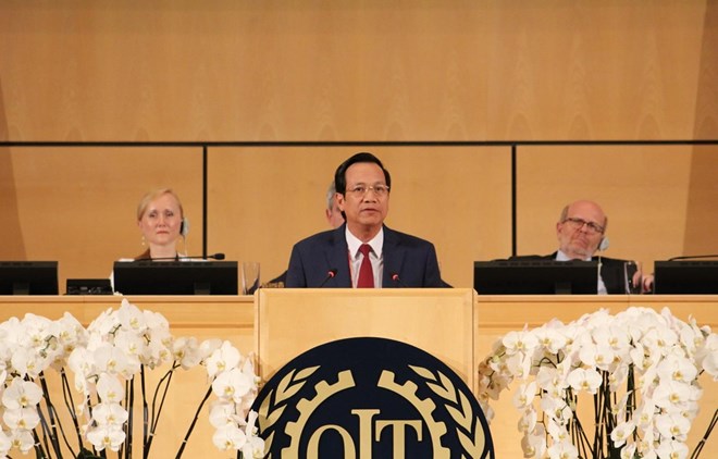 Dao Ngoc Dung, Minister of Labour, Invalids and Social Affairs, speaks at the conference. (Photo: VNA)