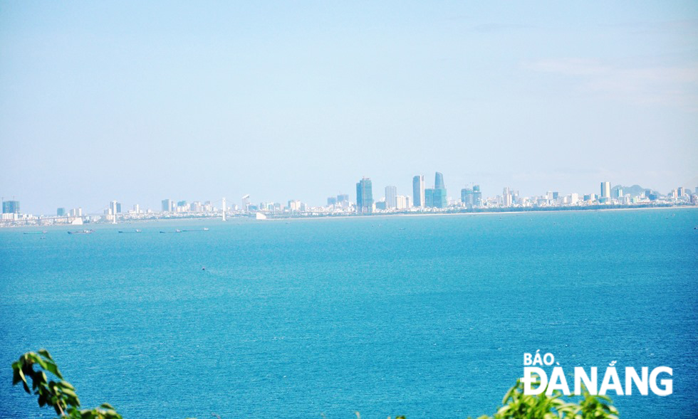 The panoramic views of Da Nang seen from a window of a train