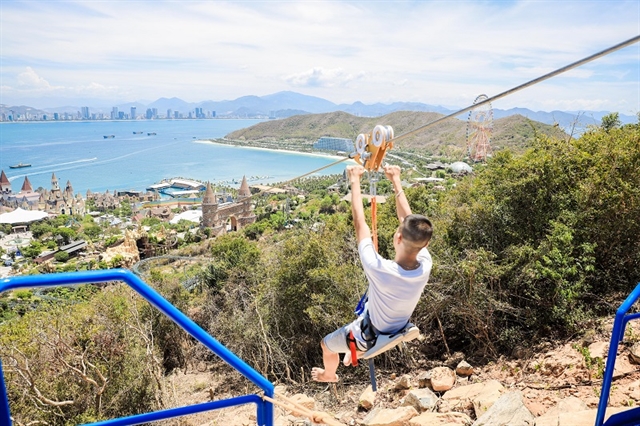 A rider tries Viet Nam’s longest zipline which has been launched in the amusement park Vinpearl Nha Trang.