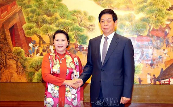 Chủ tịch Quốc hội hội đàm với Chủ tịch Nhân đại Trung Quốc