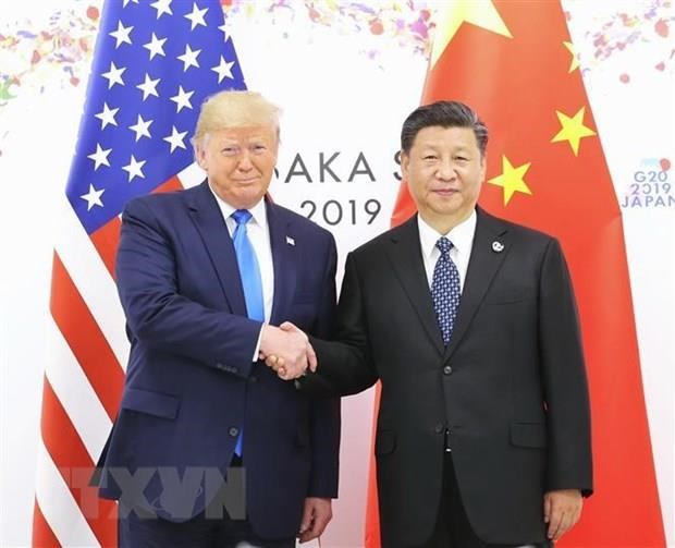 Chủ tịch Trung Quốc Tập Cận Bình (phải) và Tổng thống Mỹ Donald Trump trong cuộc gặp bên lề Hội nghị thượng đỉnh G20. (Nguồn: THX/TTXVN)