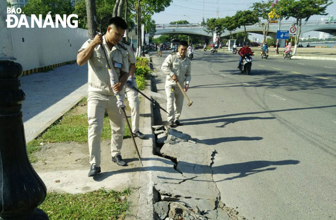 Đội Kiểm tra quy tắc đô thị quận Sơn Trà xử lý ram dốc xây dựng trái phép.