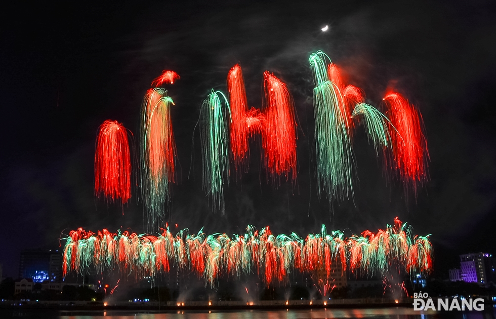 Fireworks look like a strip of soft silk across the sky during the Belgian competitors’ display