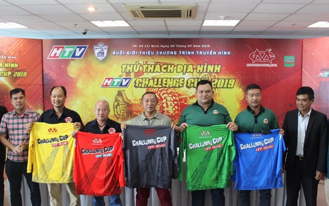 At the press conference to introduce the terrain car race (Photo: VNA)