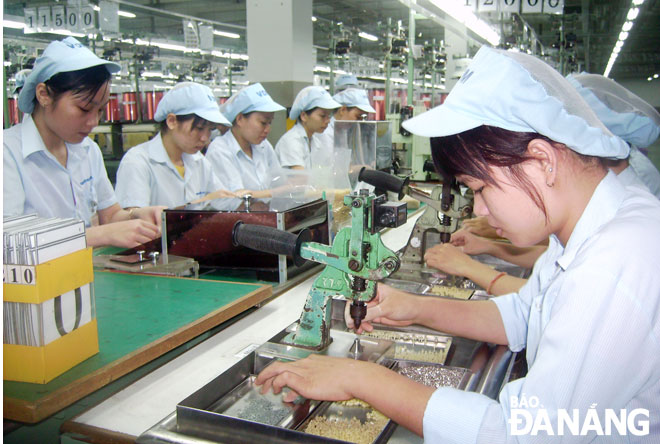 Workers at the Mabuchi Motor Da Nang Company