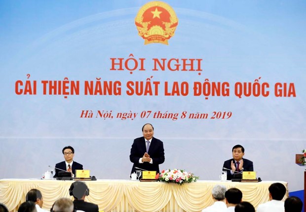 Thủ tướng Nguyễn Xuân Phúc dự Hội nghị cải thiện năng suất lao động quốc gia. (Ảnh: Thống Nhất/TTXVN)