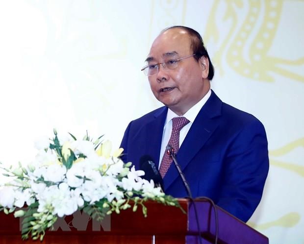 Prime Minister Nguyen Xuan Phuc speaks at the meeting (Source: VNA)