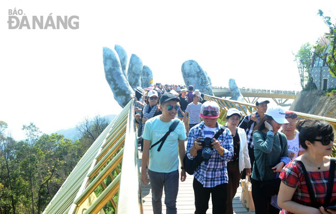 Since its debut last year, the spectacular Golden Bridge at Sun World Ba Na Hills resort has caught global attention, attracting a growing number of locals and visitors from both home and abroad.