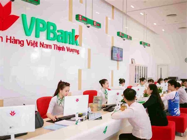 Customers make transactions at a VPBank branch. VPBank was the biggest bond issuer in the last seven months with total value of nearly VNĐ13 trillion (US$552 million). — Photo courtesy of VPBank Read more at http://vietnamnews.vn/economy/524067/banks-dominate-corporate-bond-market-in-first-seven-months-of-2019.html#BdARksDfOs9o2mZH.99