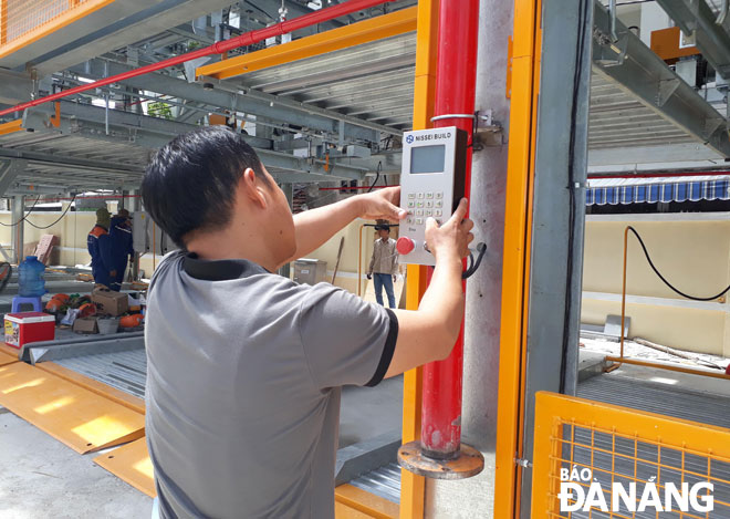  Adjusting automatic control equipment installed at the garage 