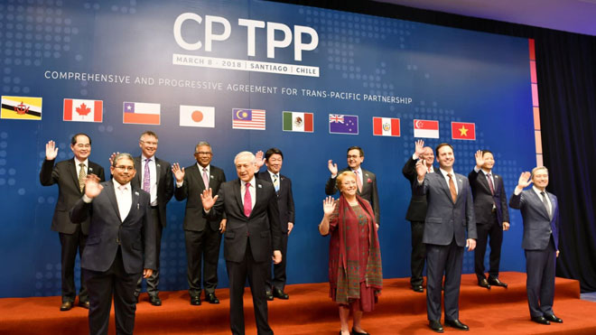 Đại diện 11 nước tham gia lễ ký Hiệp định Đối tác toàn diện và tiến bộ xuyên Thái Bình Dương (CPTPP) chụp ảnh chung tại hội nghị ở Santiago, Chile. 	 Ảnh: Nikkei Asian Review