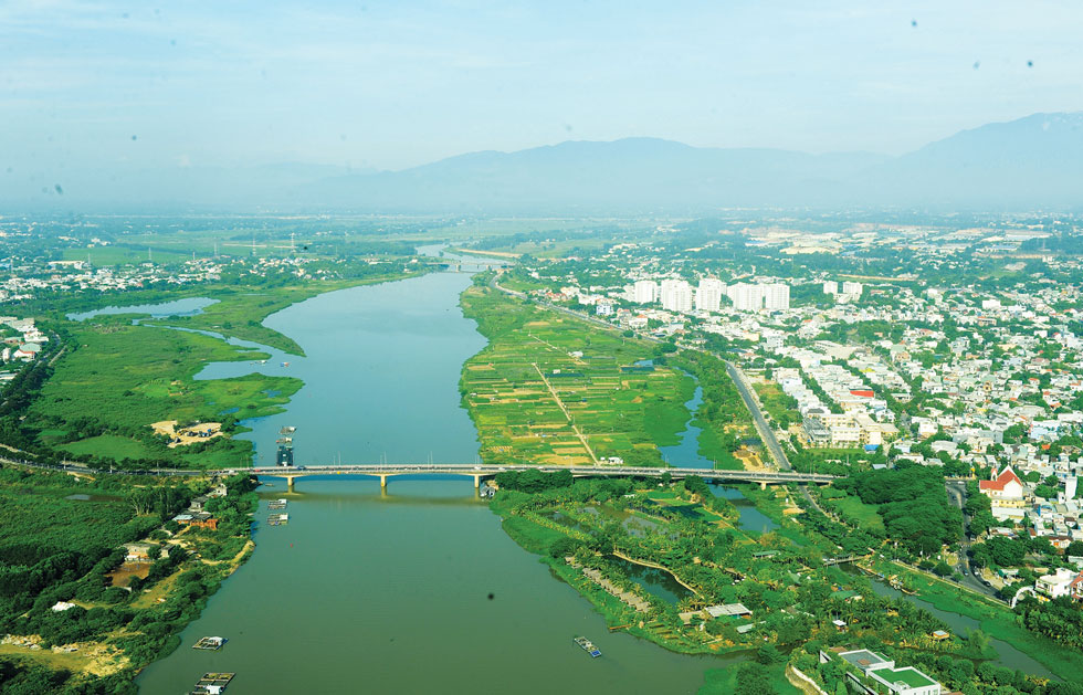 The Cam Le Bridge and the La Huong vegetable growing area (right)