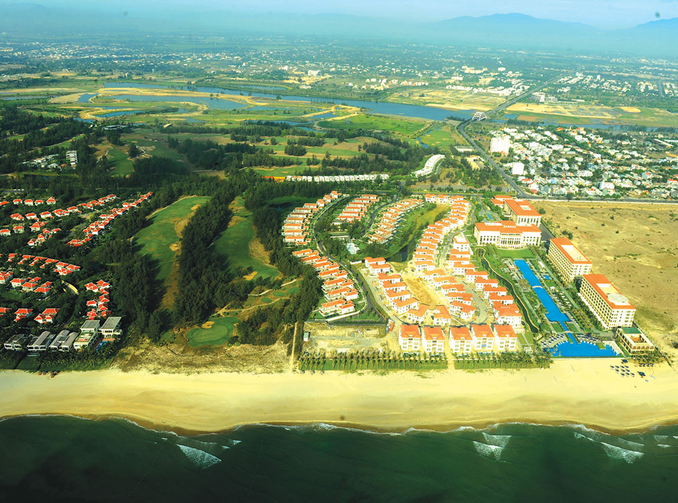 Modern resorts covered with green space along the coastal Truong Sa Street