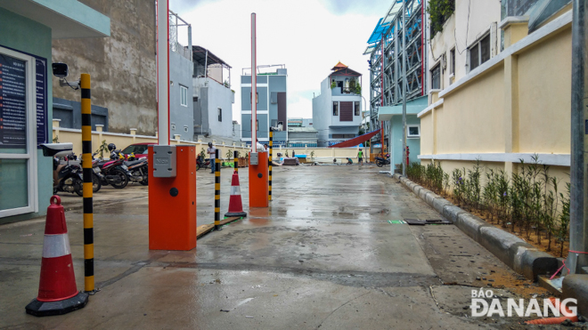 The entrance gate to the parking area with automatic guarding system