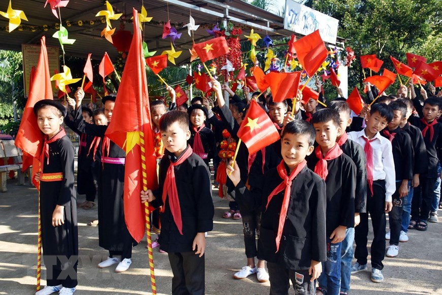 Học sinh trường Trung học cơ sở Thổ Bình, huyện Lâm Bình, tỉnh Tuyên Quang khai giảng năm học mới 2019-2020. (Ảnh: Quang Cường/TTXVN)