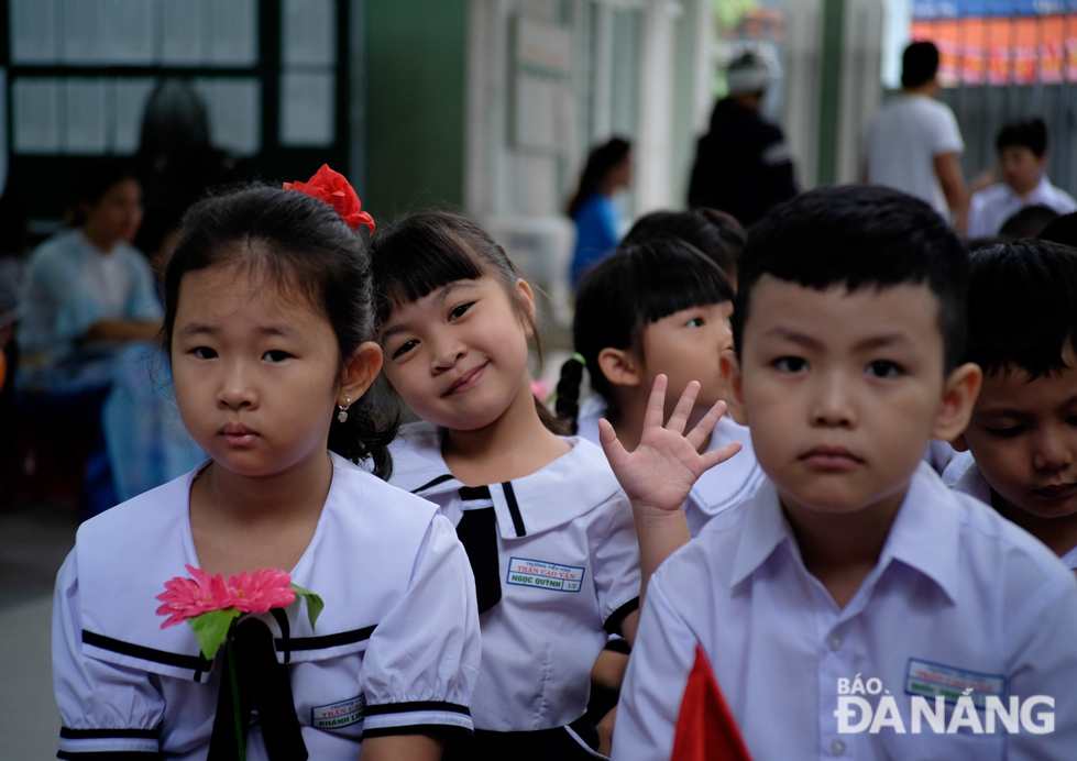  Some showing their smiley faces during the new academic year welcoming ceremony whislst others still hold feelings of anxiety