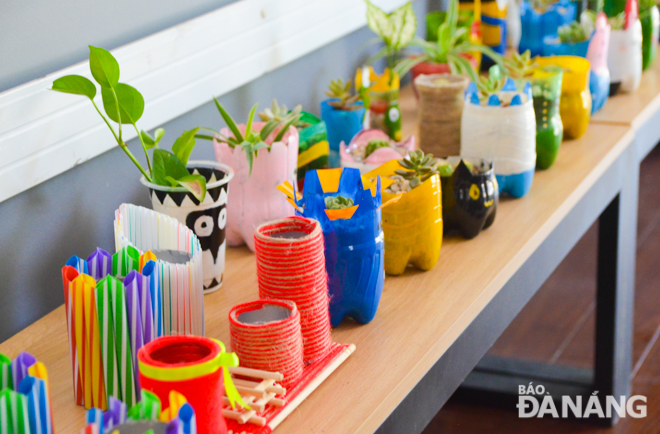  Here are colourful flower vases and decorative items made from plastic waste