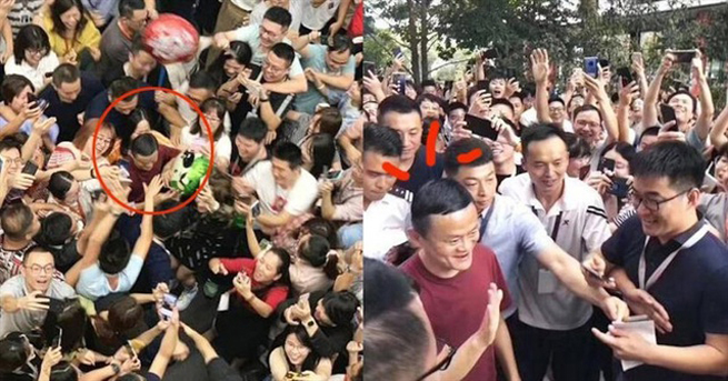 Jack Ma trong vòng vây của nhân viên khi tới công ty chào tạm biệt các đồng nghiệp.