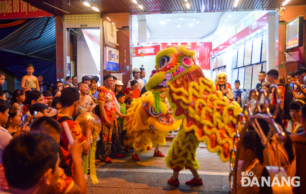 An impressive lion dance performance at a local shop