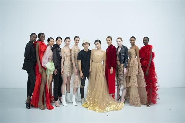 Designer Tran Hung and his team of models at the London Fashion Week 2019. Photo courtesy of the designer